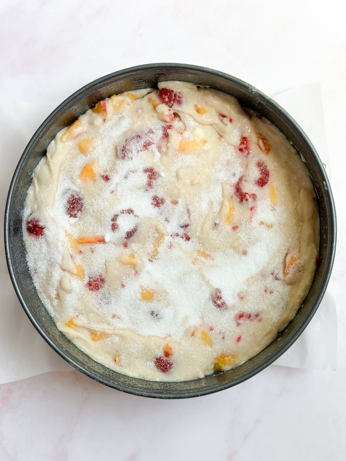 batter added to the pan and sugar topped.