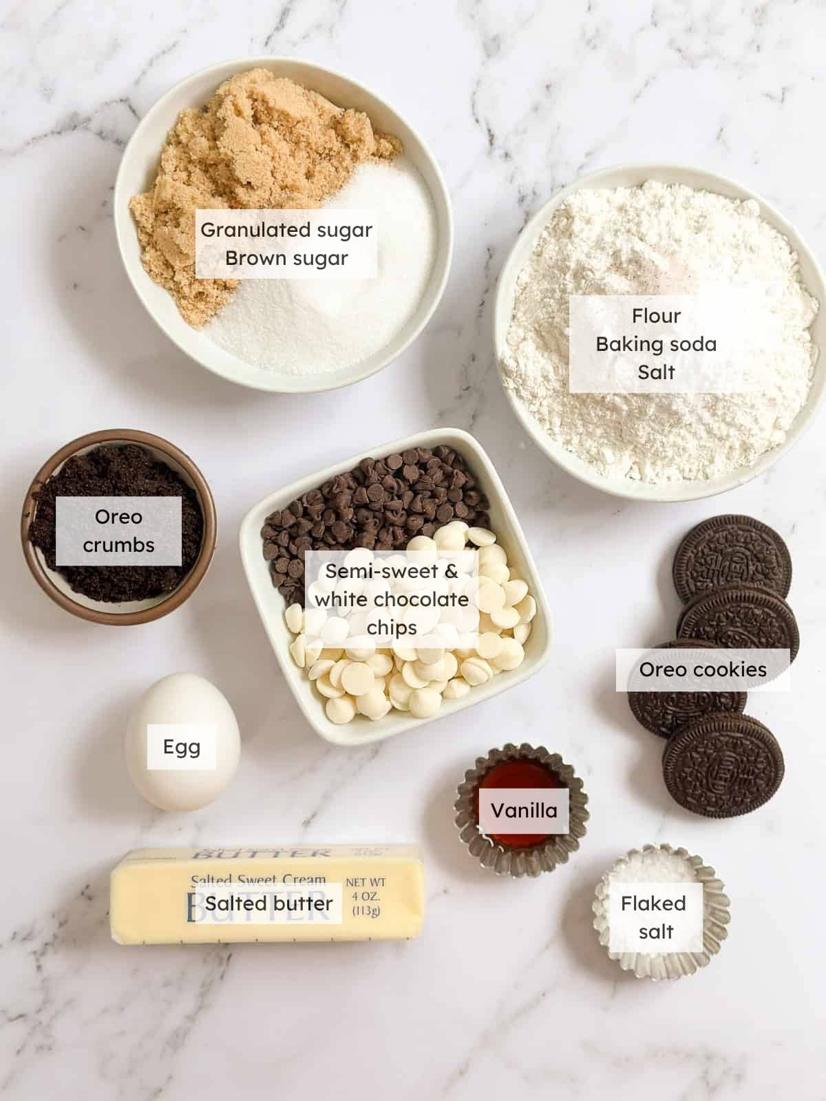 All of the ingredients needed to make cookies and cream cookies.