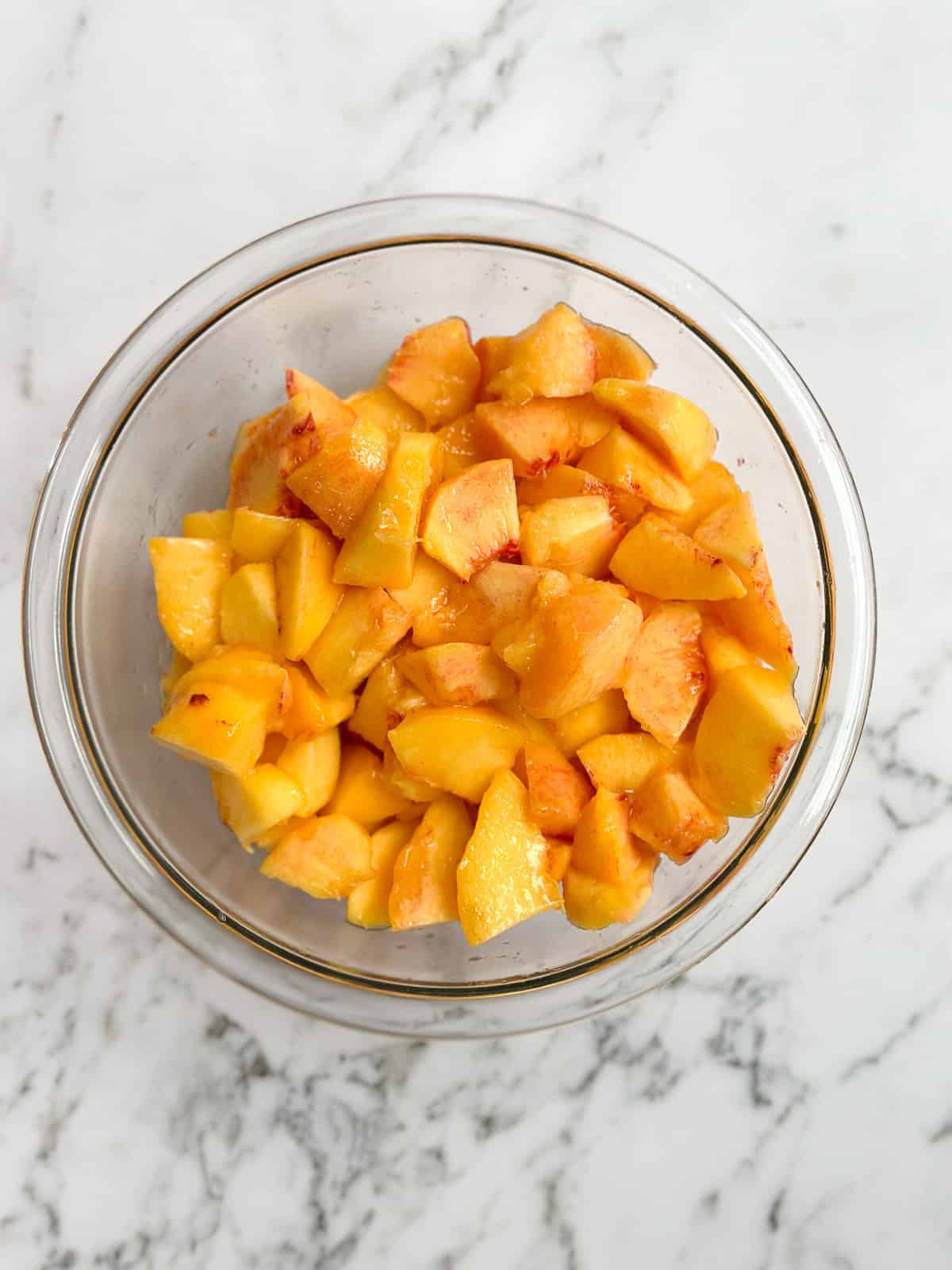 fresh peaches cut and peeled.