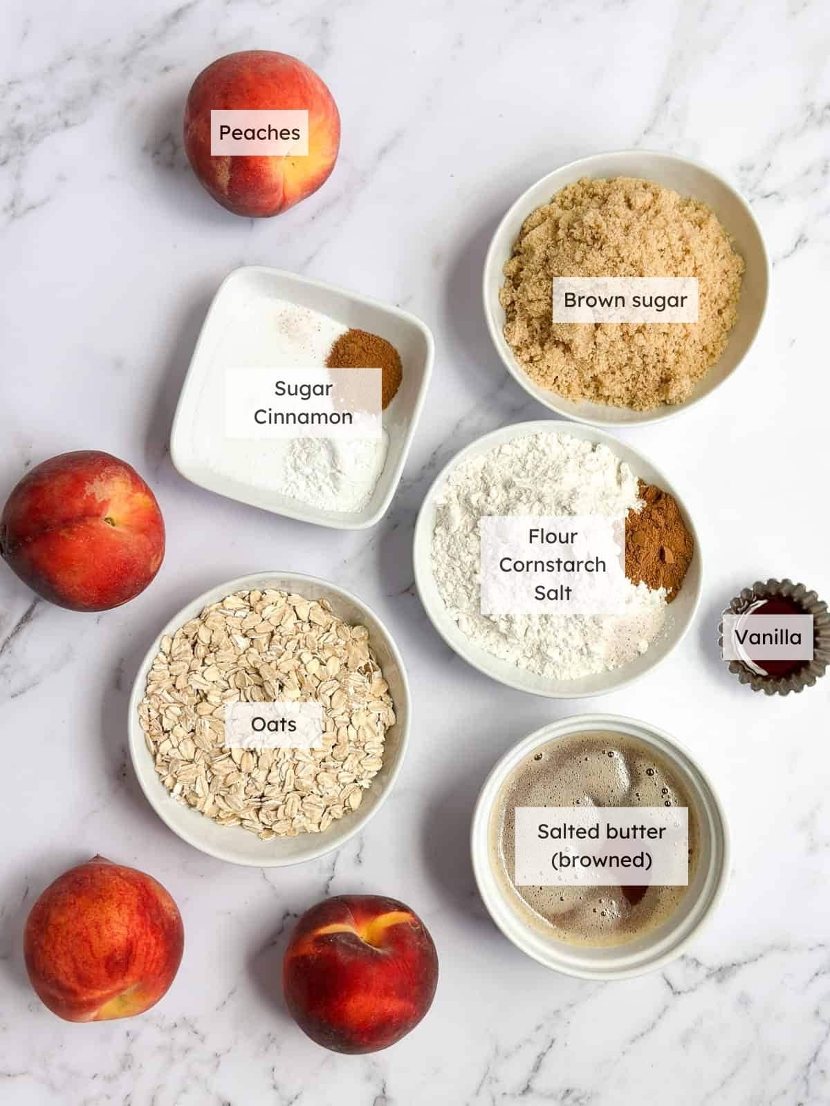 All of the ingredients needed to make brown butter peach crisp.