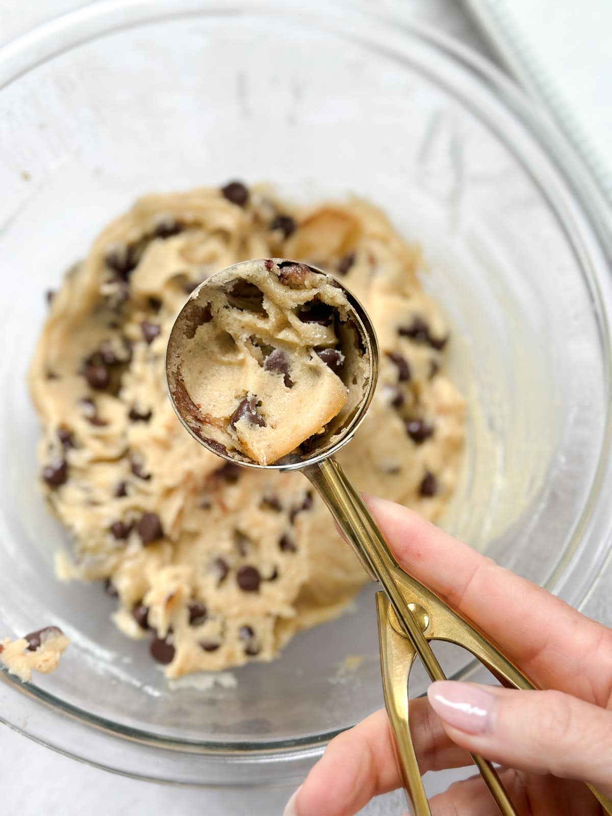 the first part of the scoop filled with chocolate chip cookie dough.