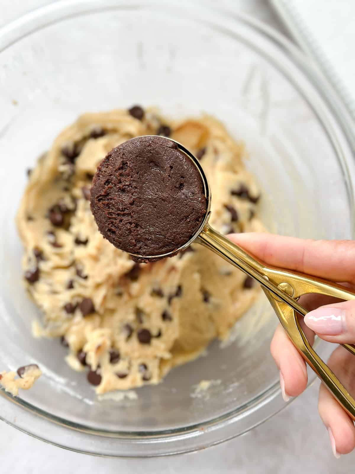 cookie scoop filled with brownie dough.