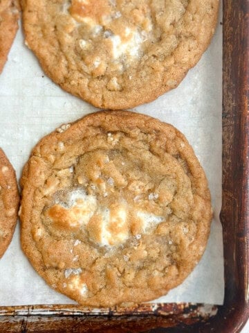 a few marshmallow crispy cookies (costco copycat) on a cookie sheet.