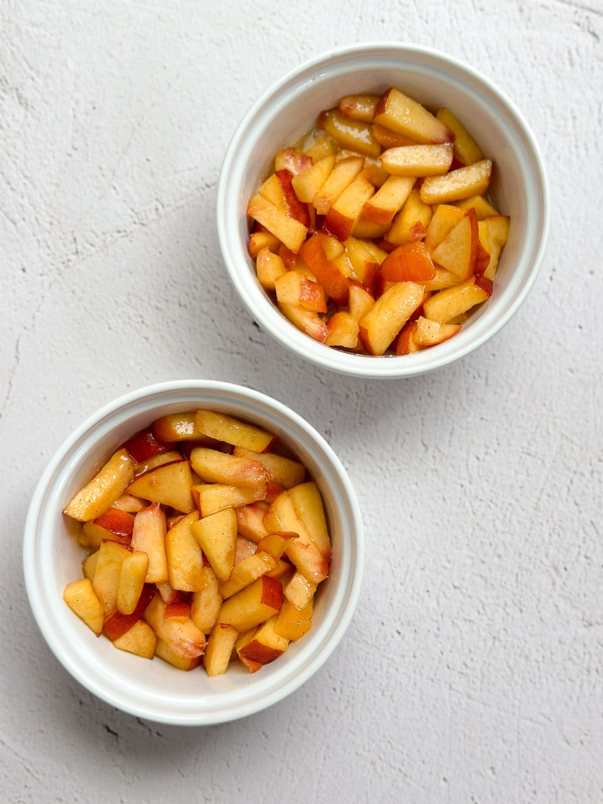 peaches added to the ramekins.