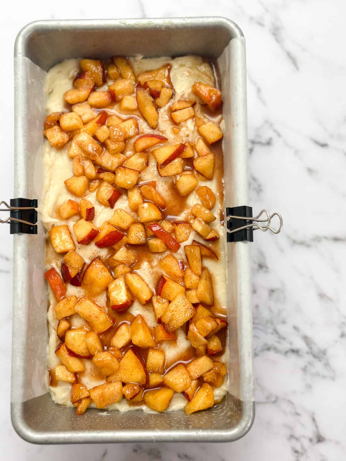 fresh peach loaf cake before baking.