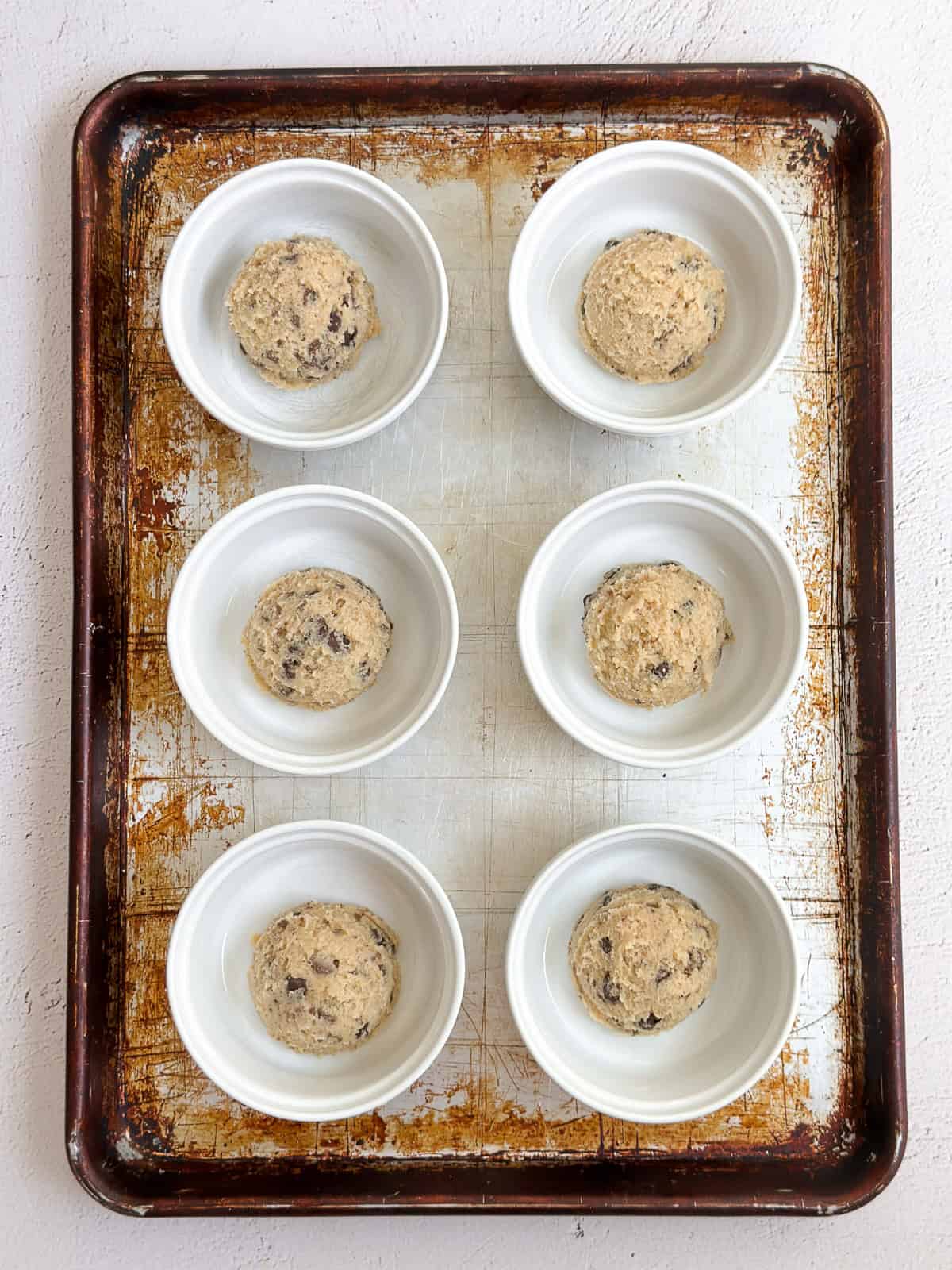 cookie dough scooped into ramekins.