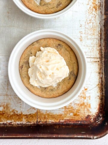 mini chocolate chip cookie sundaes on a baking sheet.