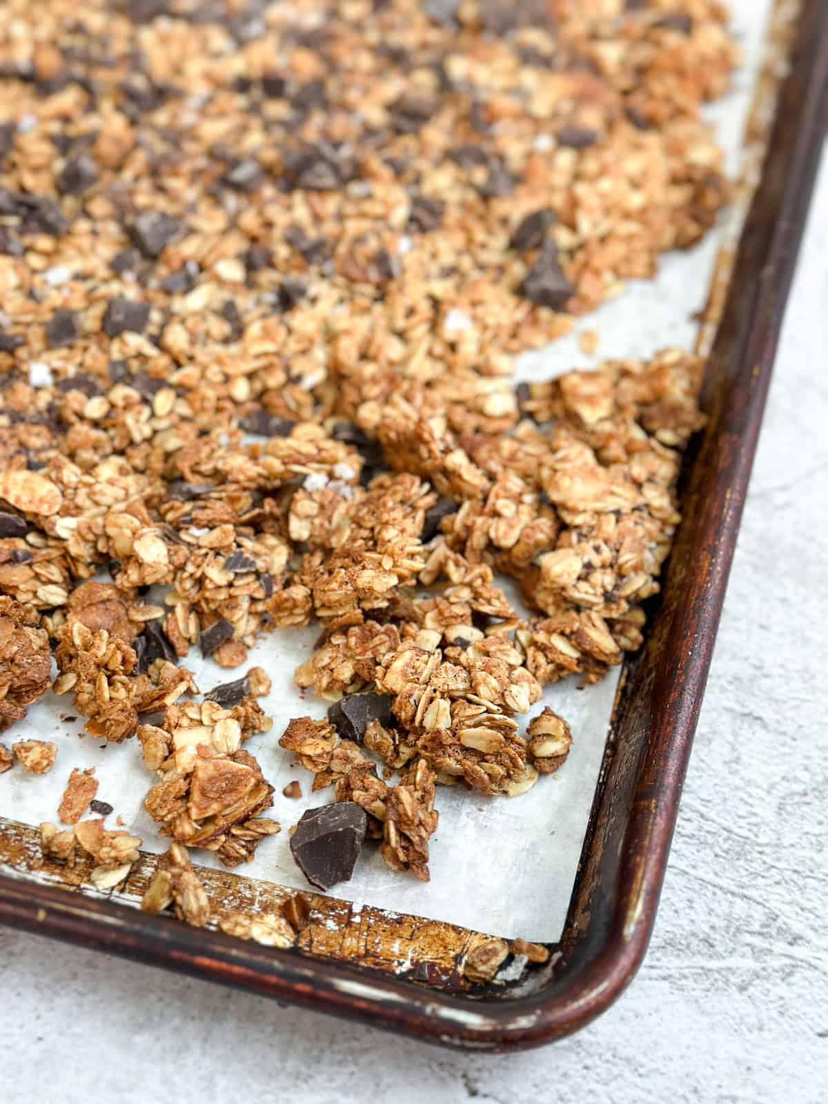 pieces of the homemade peanut butter protein granola broken into chunks.