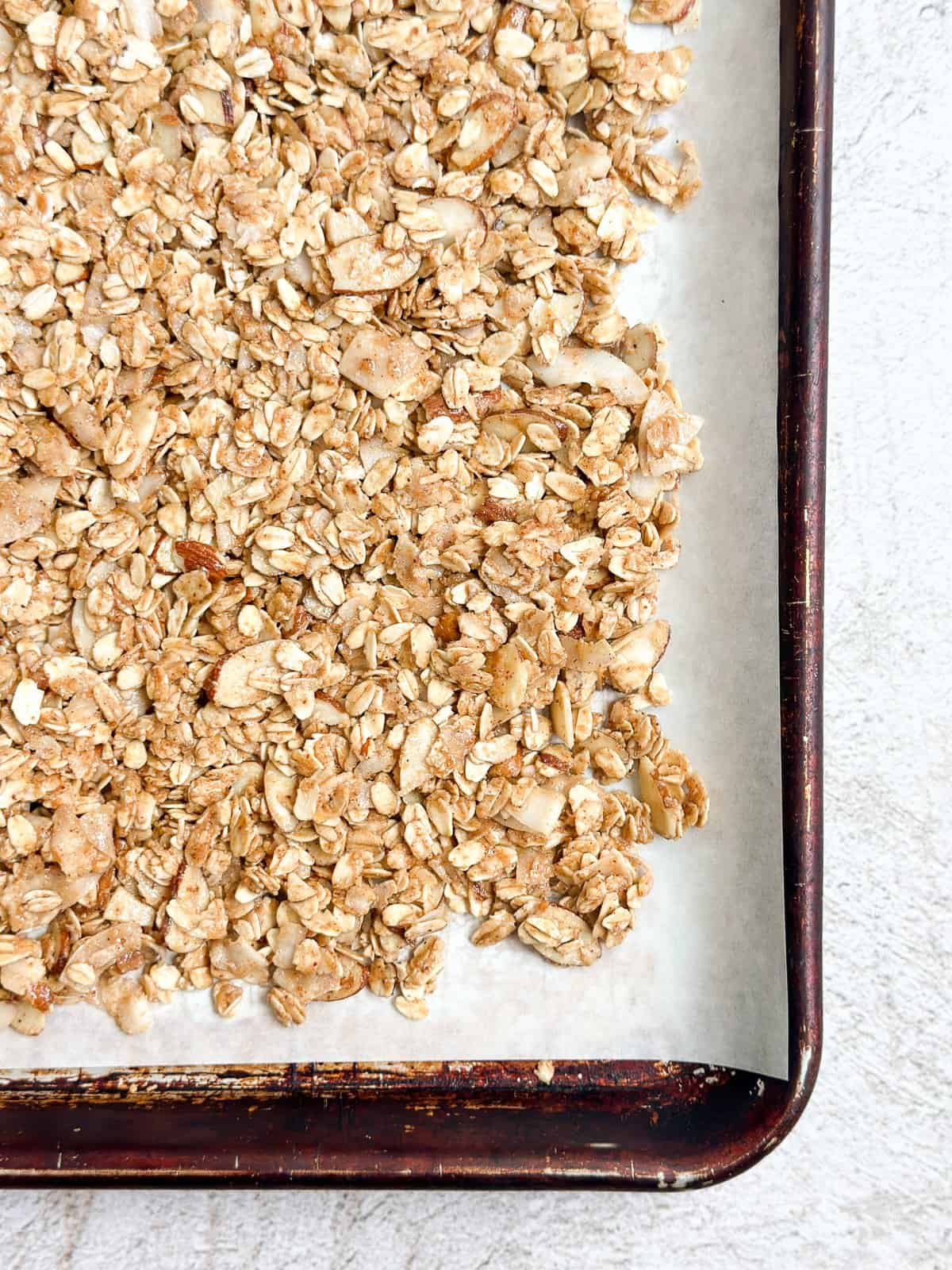 granola on a cookie sheet before baking.