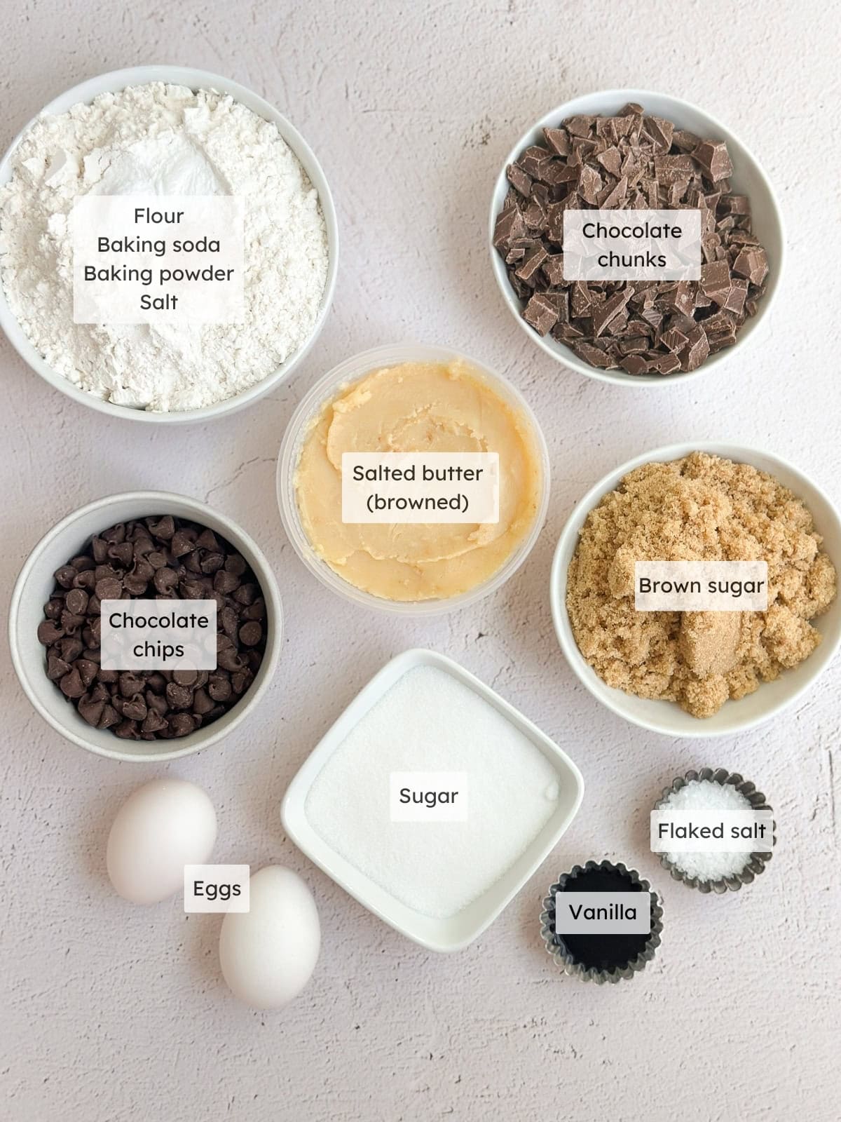 All of the ingredients needed to make brown butter chocolate chip cookies.