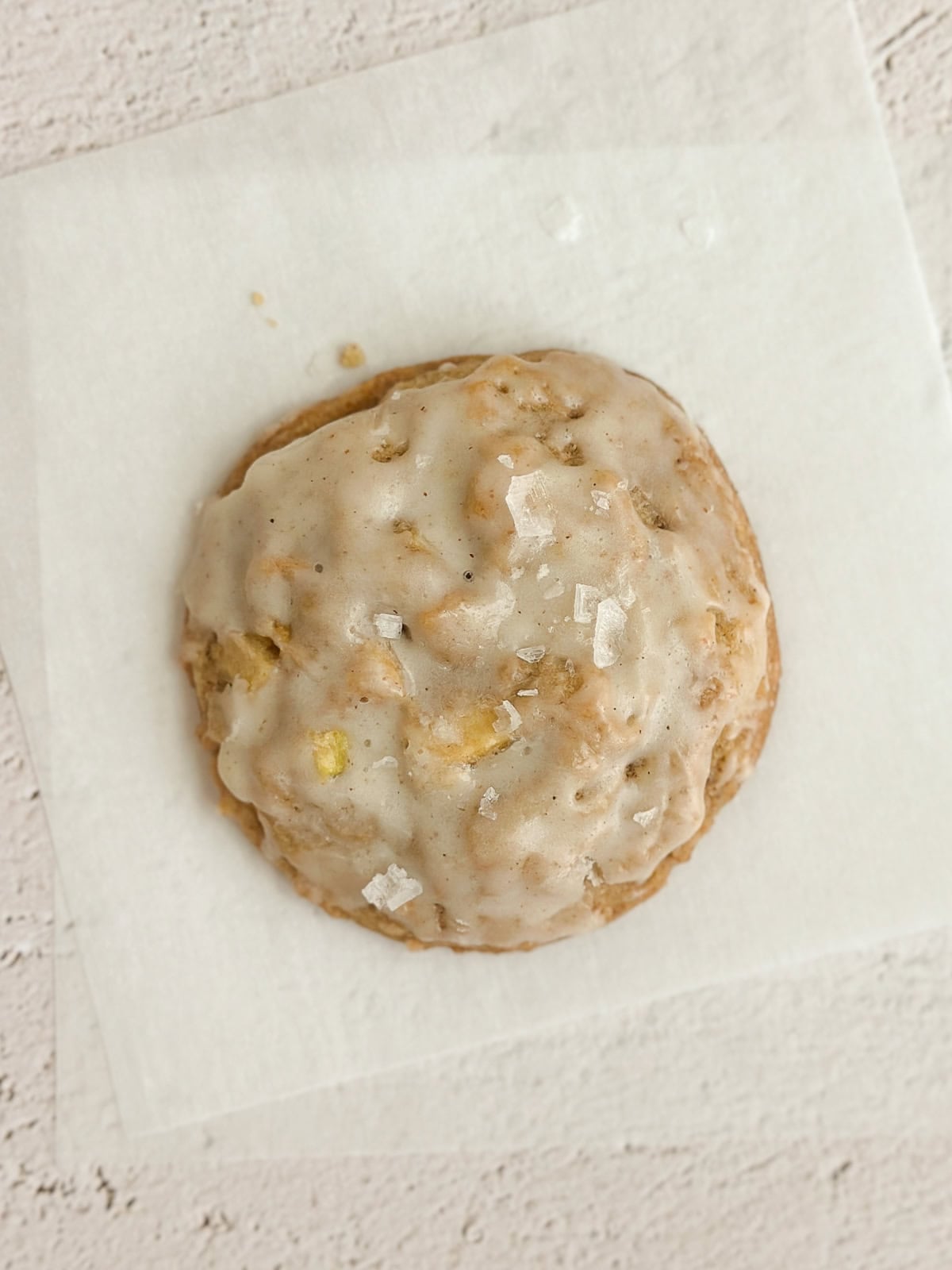 a close up of a single apple cinnamon cookie.