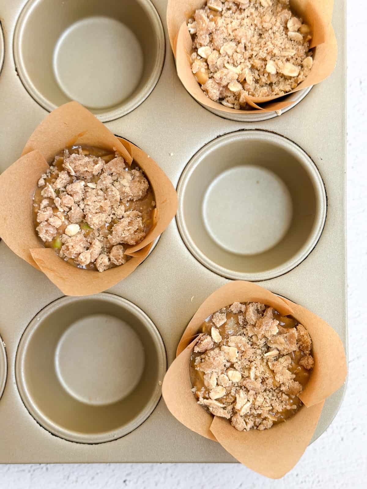 oat crumble on top of the muffins.