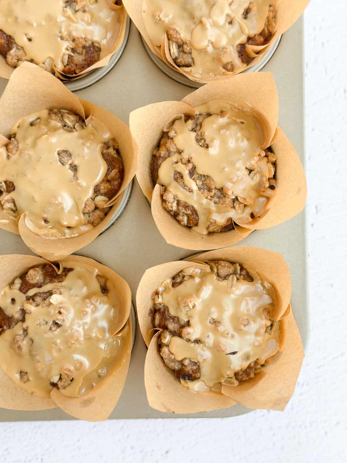 the apple cinnamon oat muffins drizzled with espresso glaze.