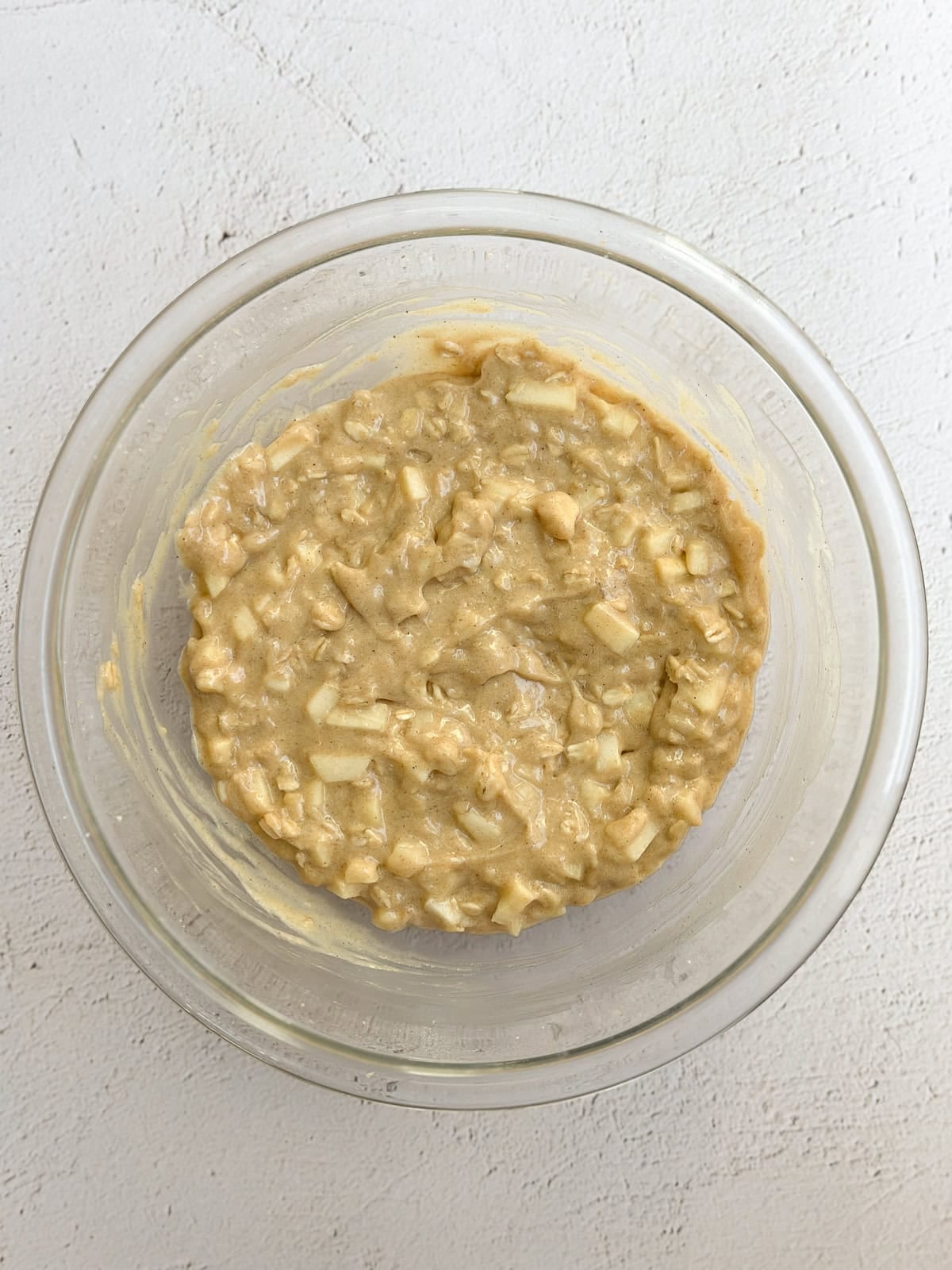 apples added into the cake batter.