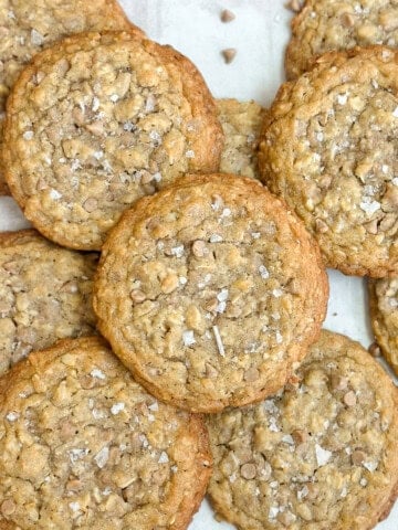 a bunch of cinnamon chip oatmeal cookies stacked together.