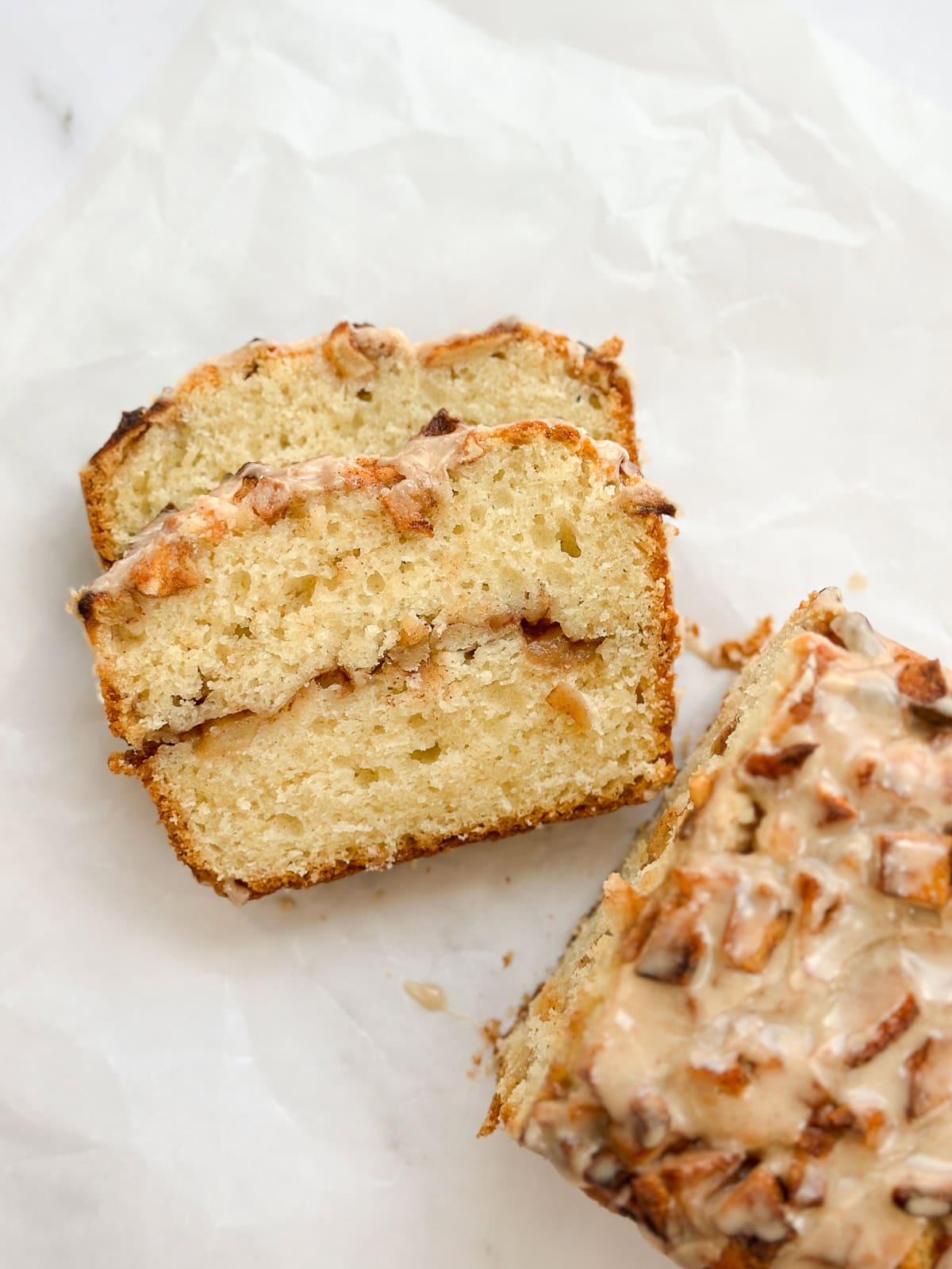 a few slices of the apple fritter bread on the side of the loaf.