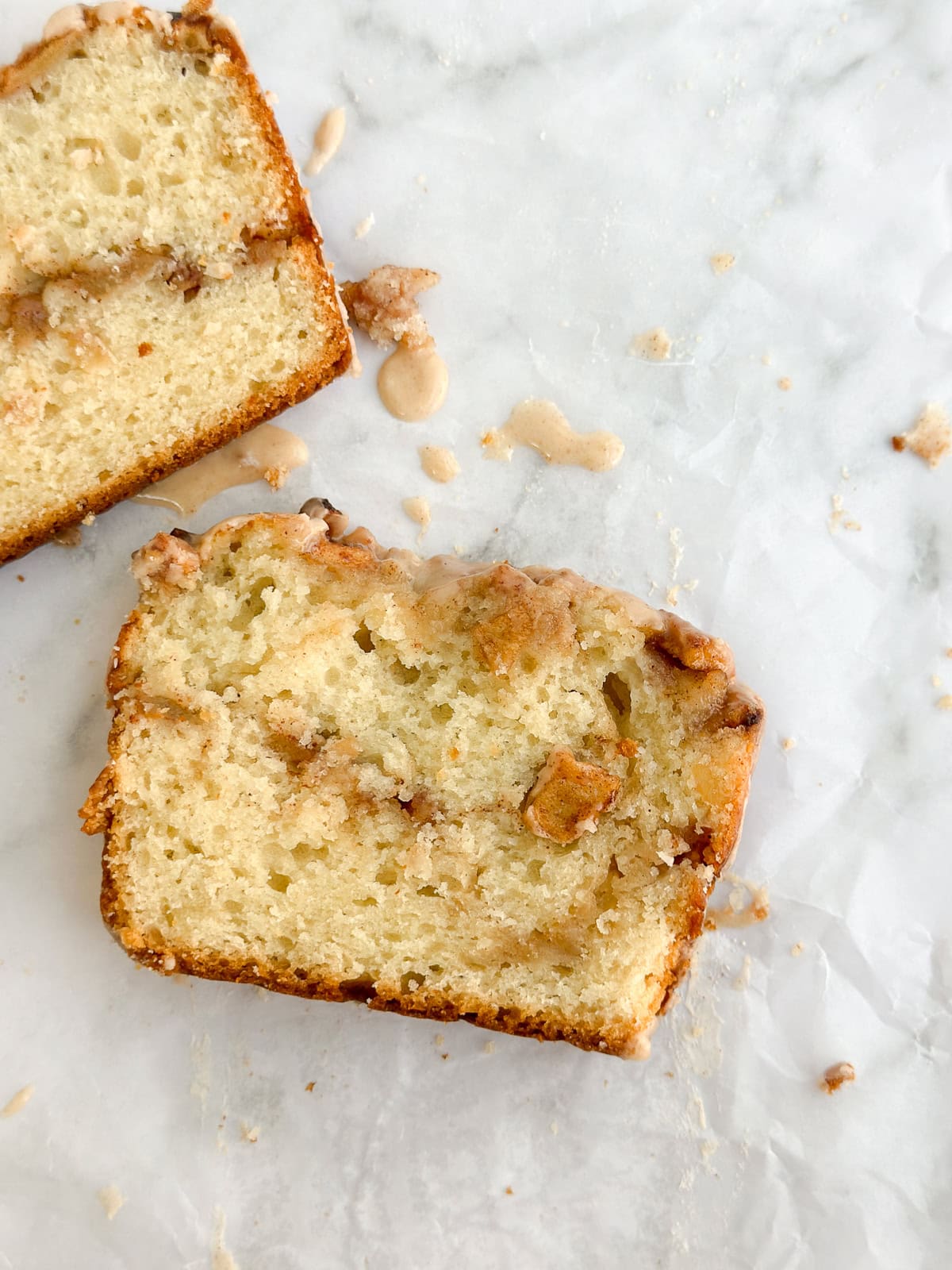 a single slice of the apple fritter bread so you can see the layers of apples.