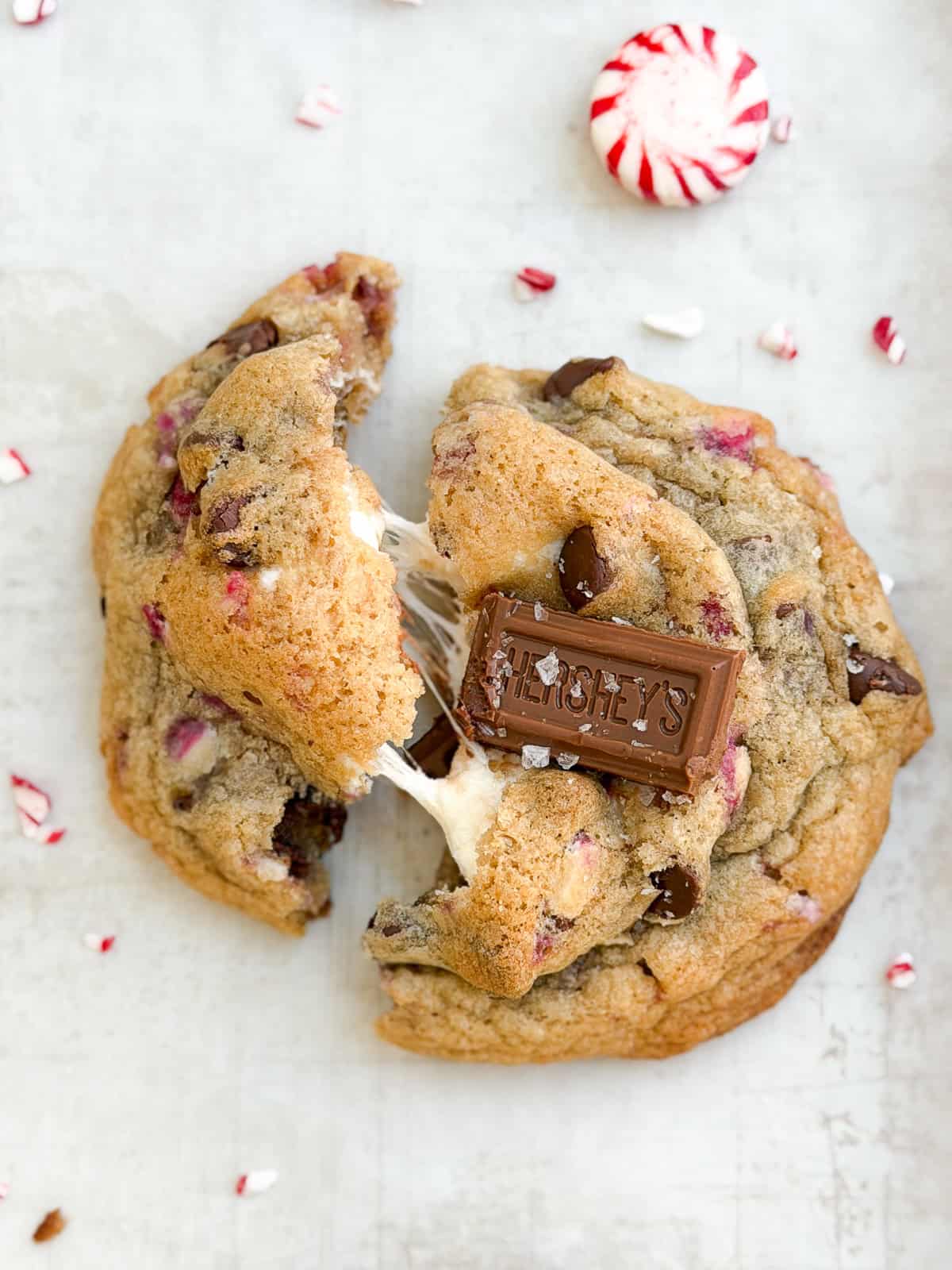 the marshmallow being pulled on a cookie.