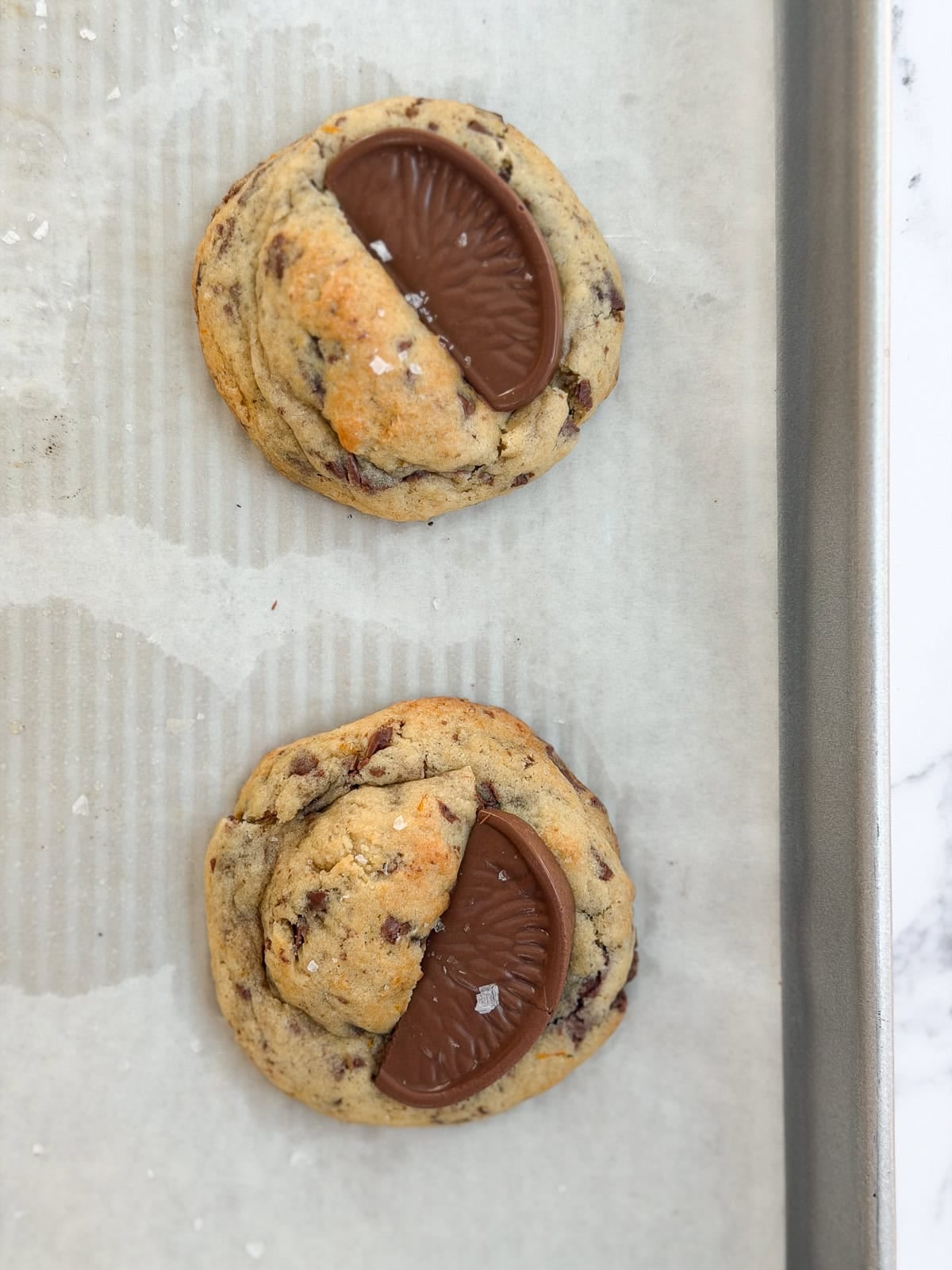 fresh cookies right after baking and topping with the terrys chocolate orange.