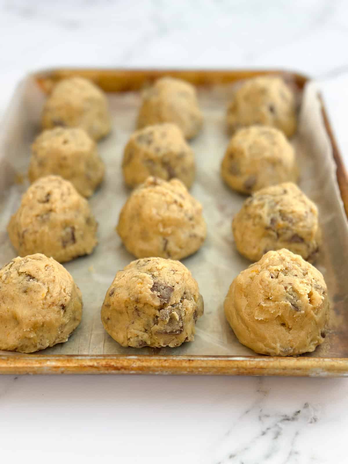 dough balls scooped and shaped tall.