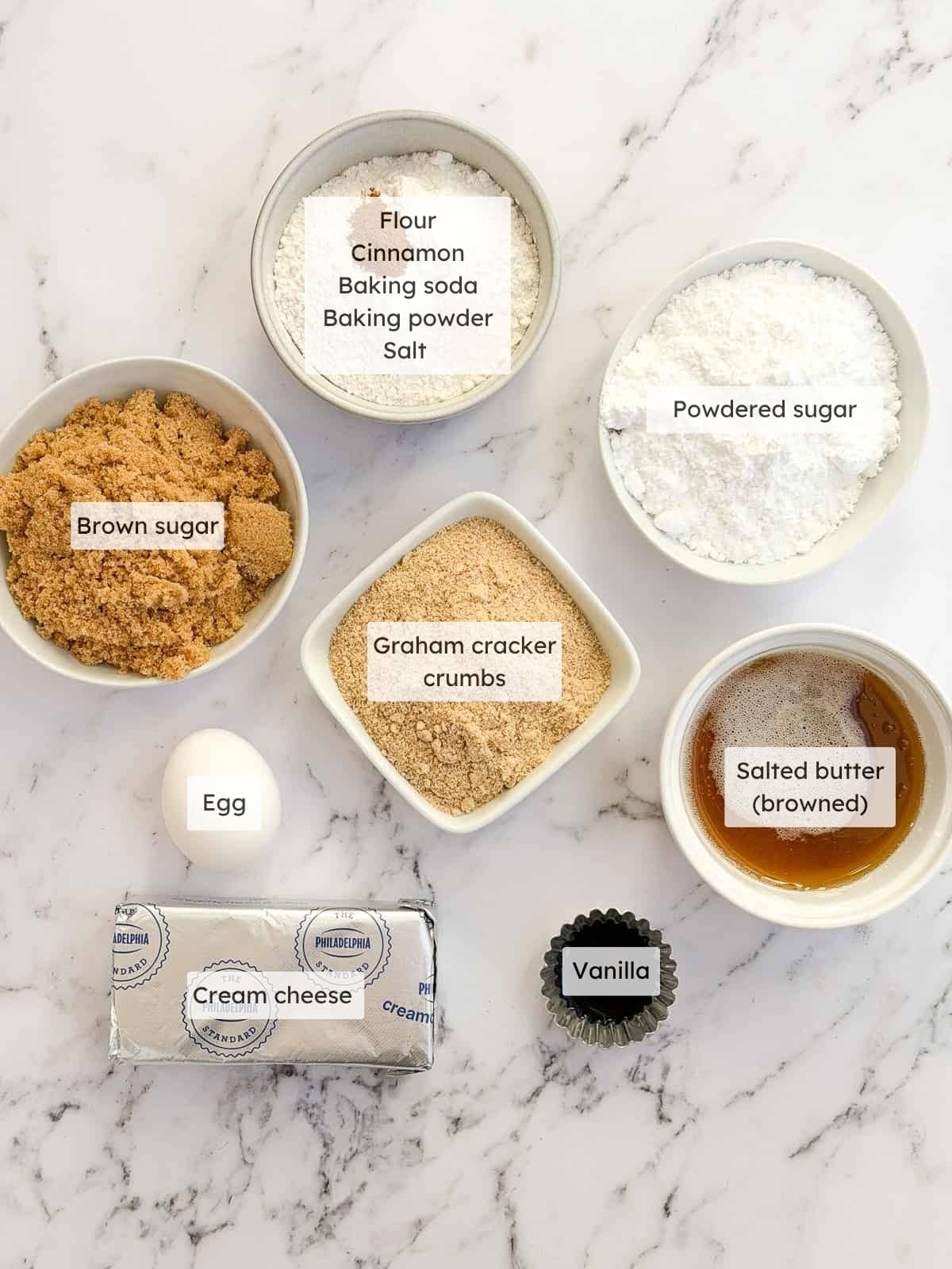 All of the ingredients needed to make salted caramel cheesecake cookies.