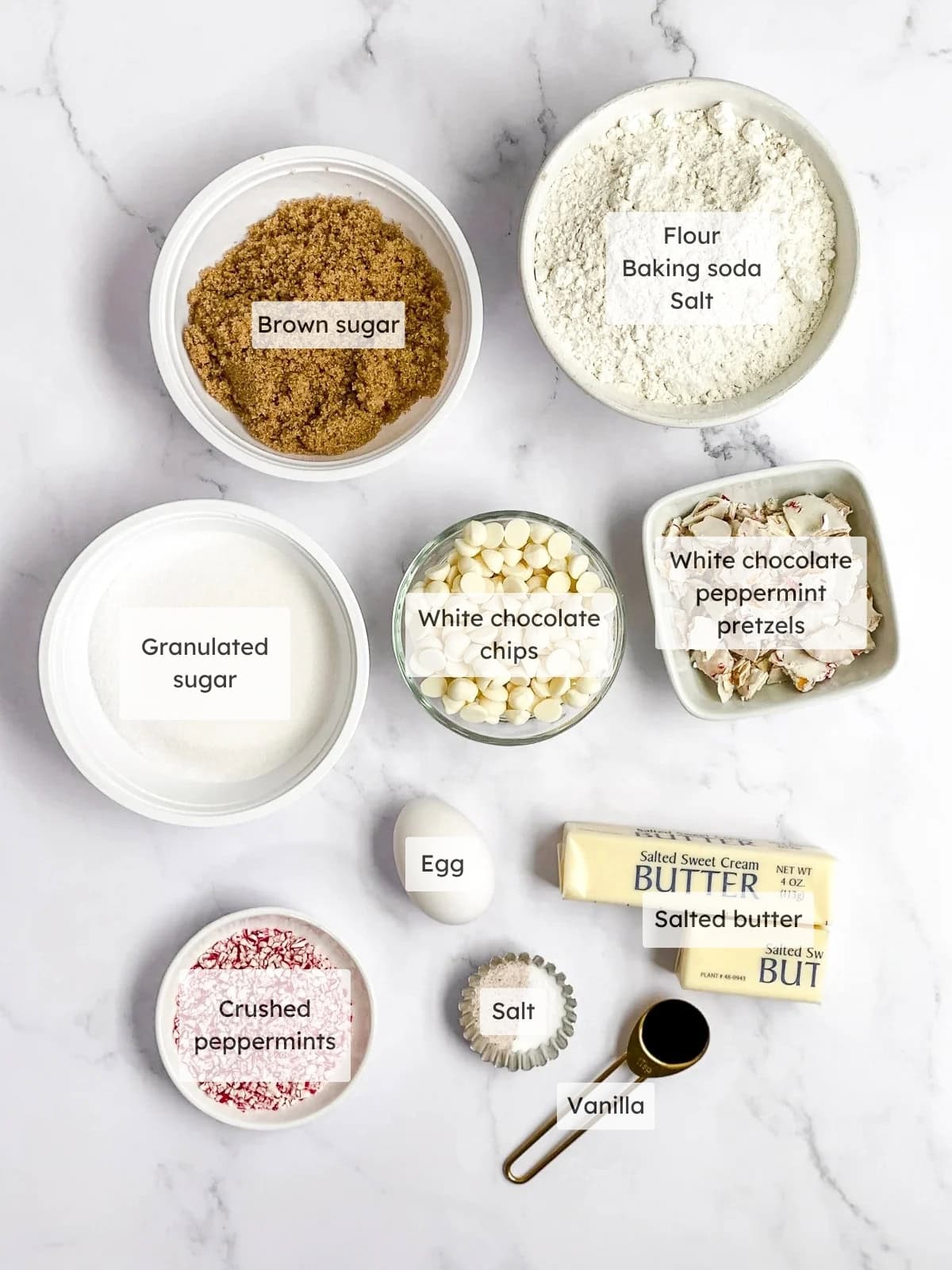 All the ingredients needed to make white chocolate peppermint pretzel cookies.