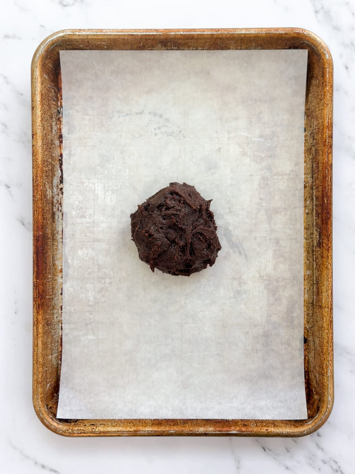 the cookie dough ball before baking.