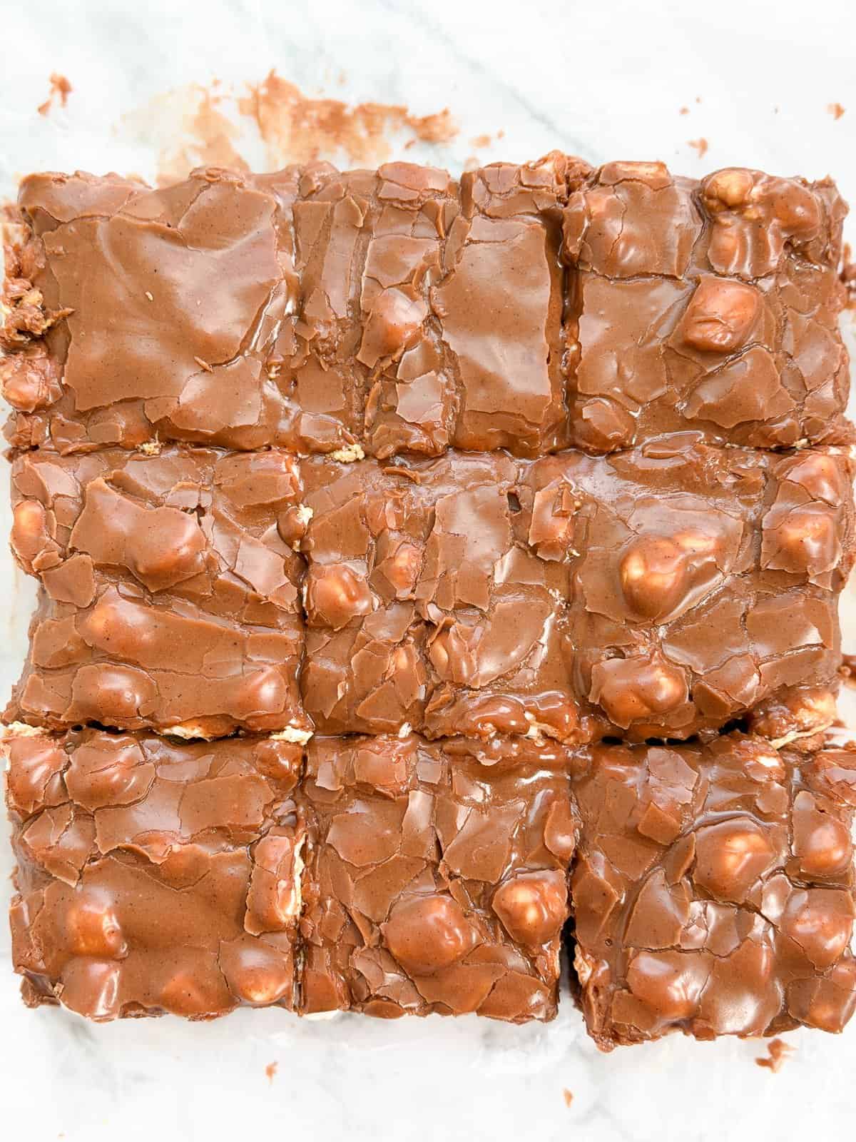 a close up of all the brownies right after being cut.