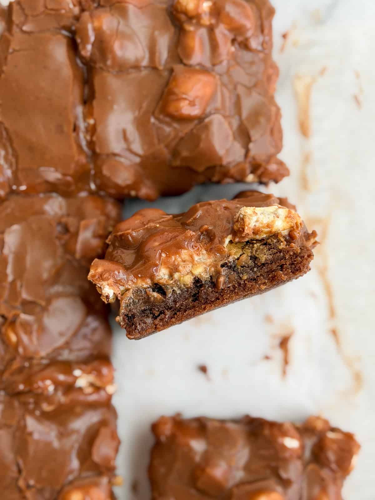 a side view of a peanut butter marshmallow brownies to see the layers.