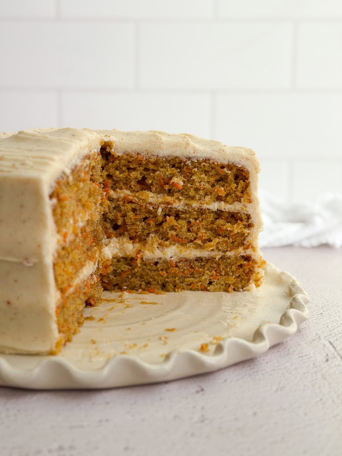the carrot cake cut so you can see all the layers inside.