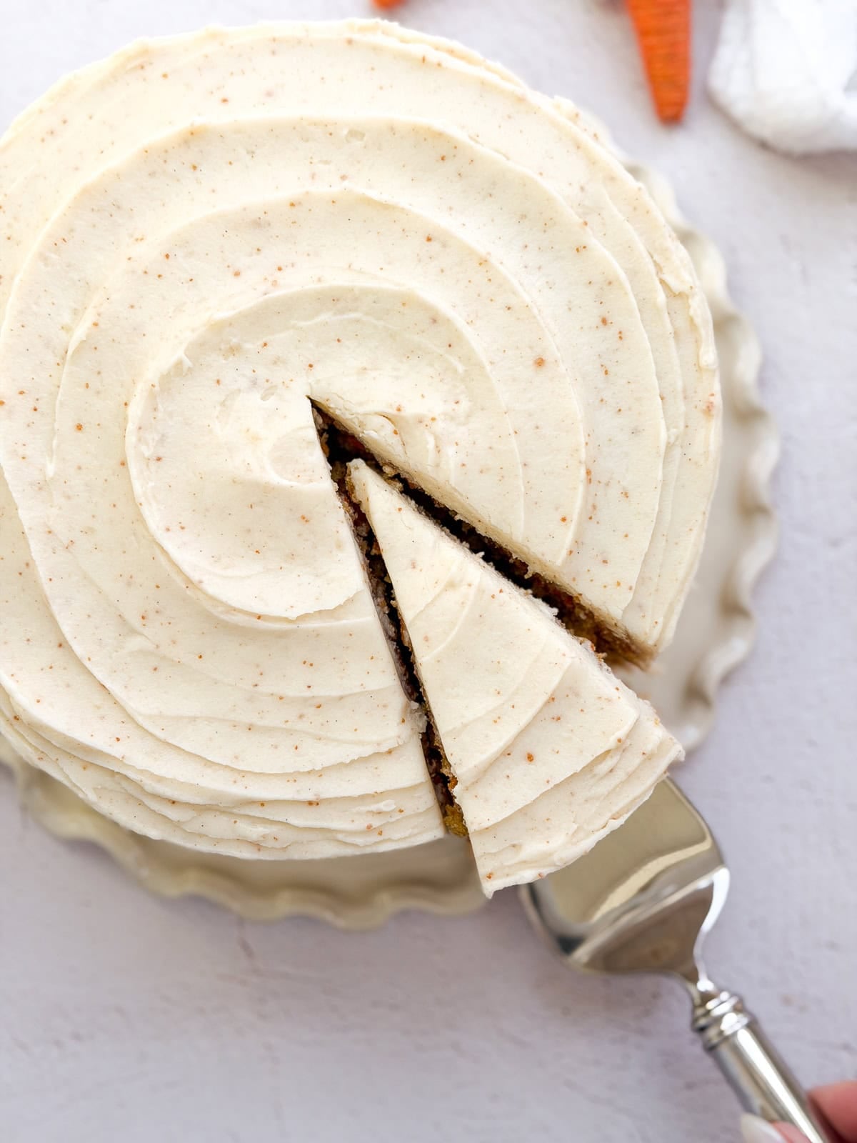 a slice of cake coming out from the cake.
