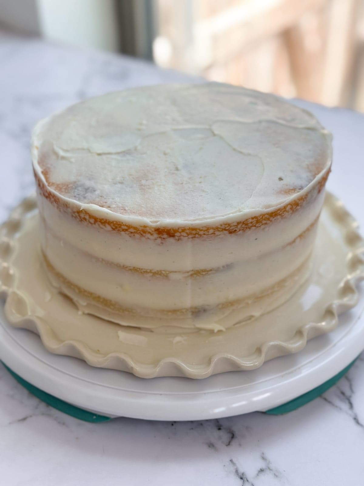 crumb coat on the outside of the cake.