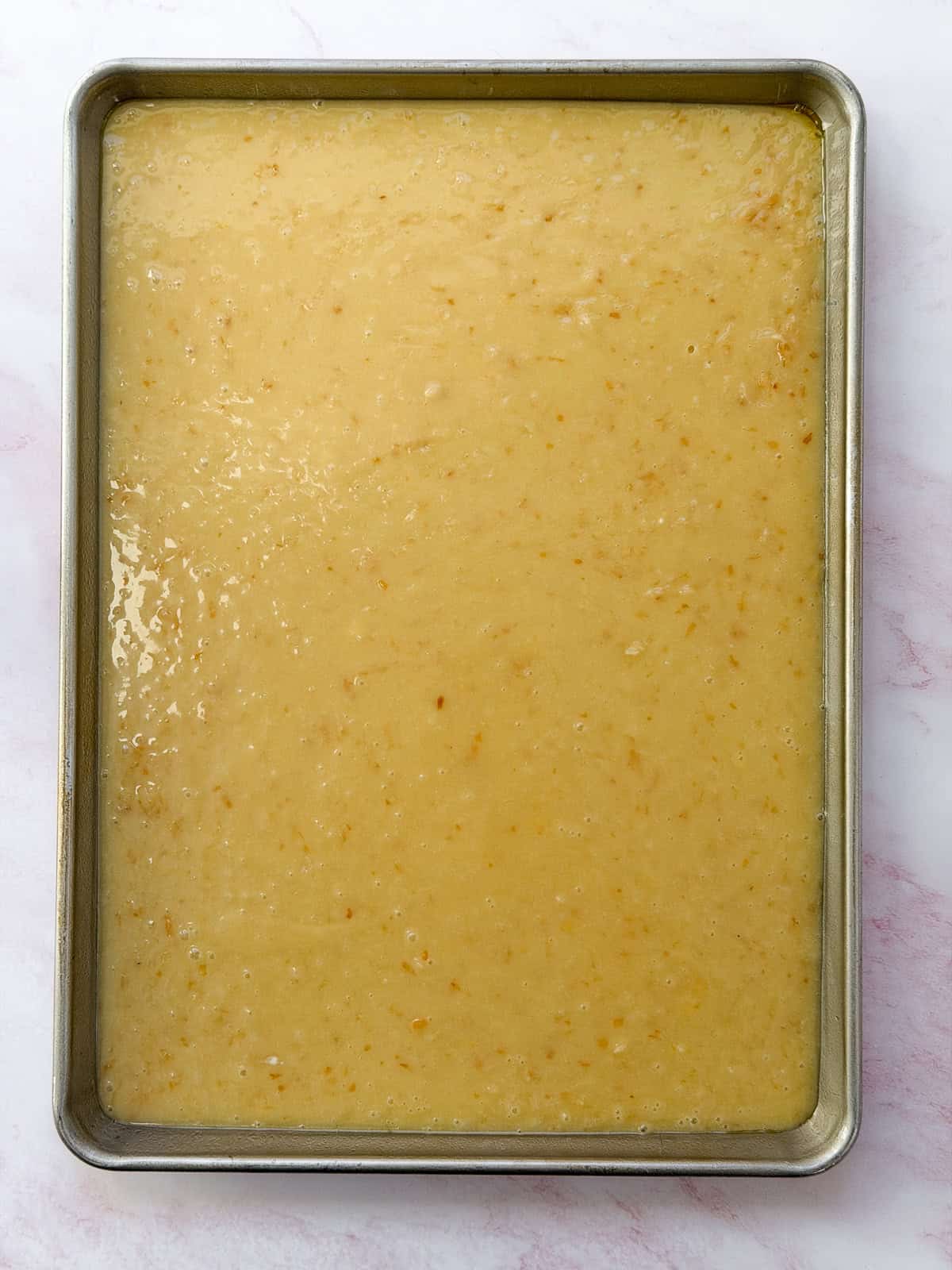 cake batter in the pan ready to bake.