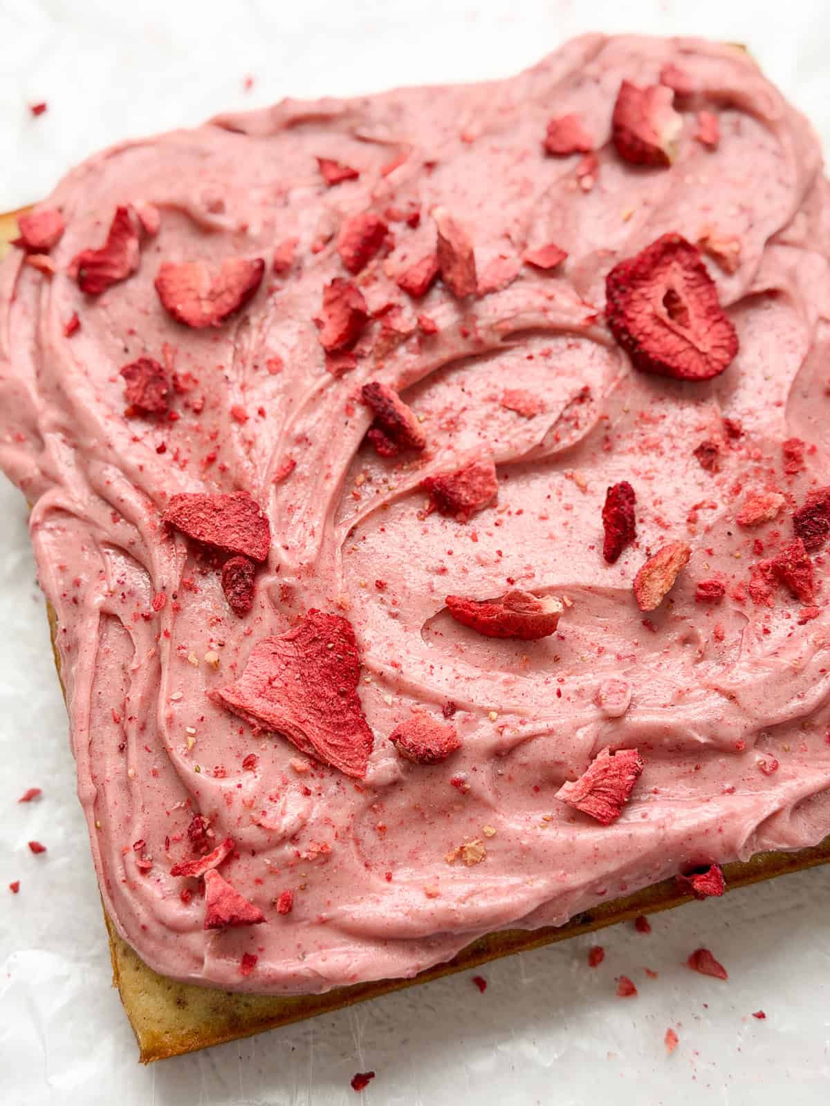 the whole strawberry snack cake before being cut.