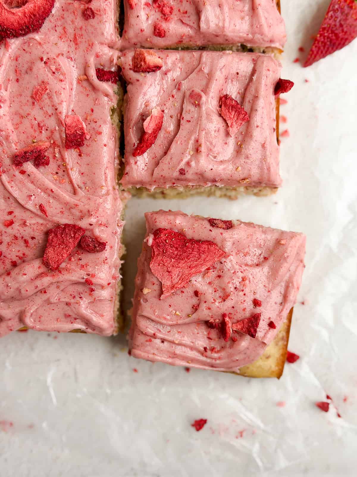 a close up of a single slice of the strawberry snack cake.