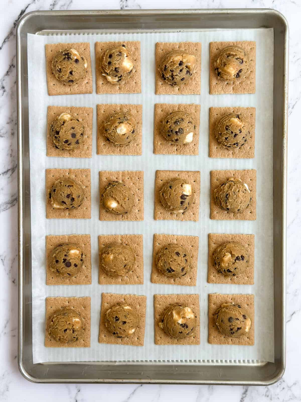 cookies before baking topped on the graham crackers.