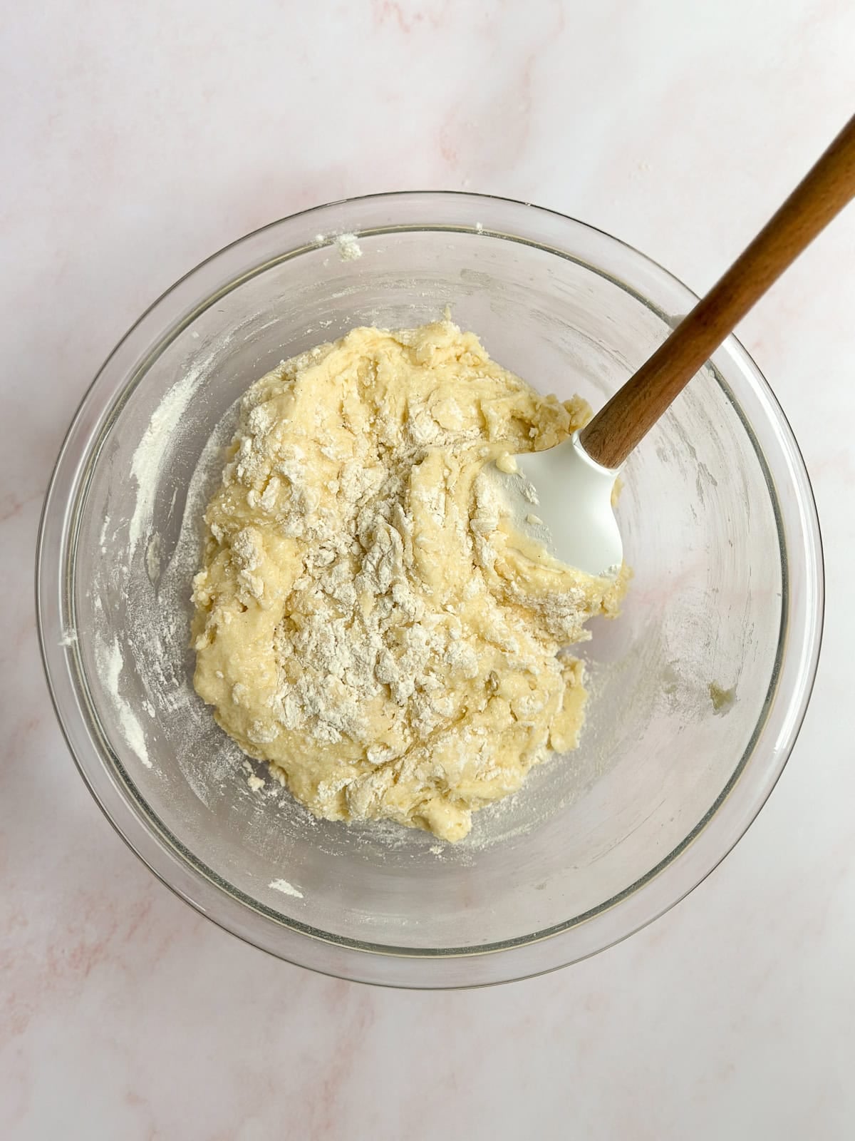 adding in the flour.