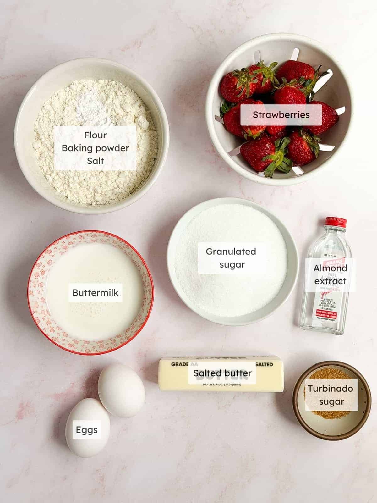 All of the ingredients needed to make strawberry buttermilk cake.
