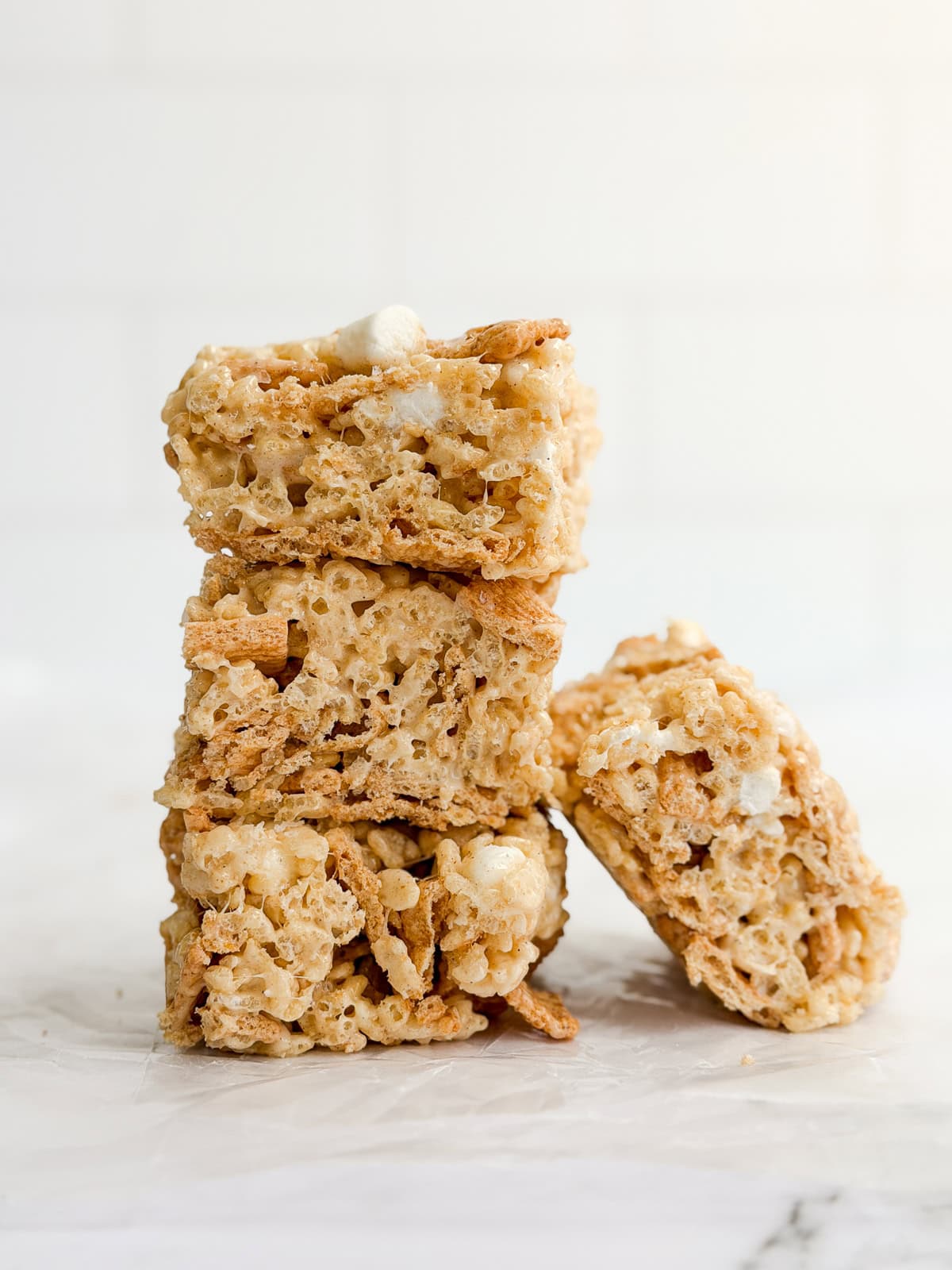 a few cinnamon toast crunch treats stacked on top of each other.