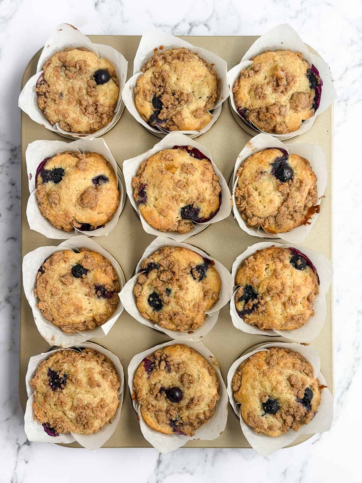 the whole pan of blueberry peach muffins,