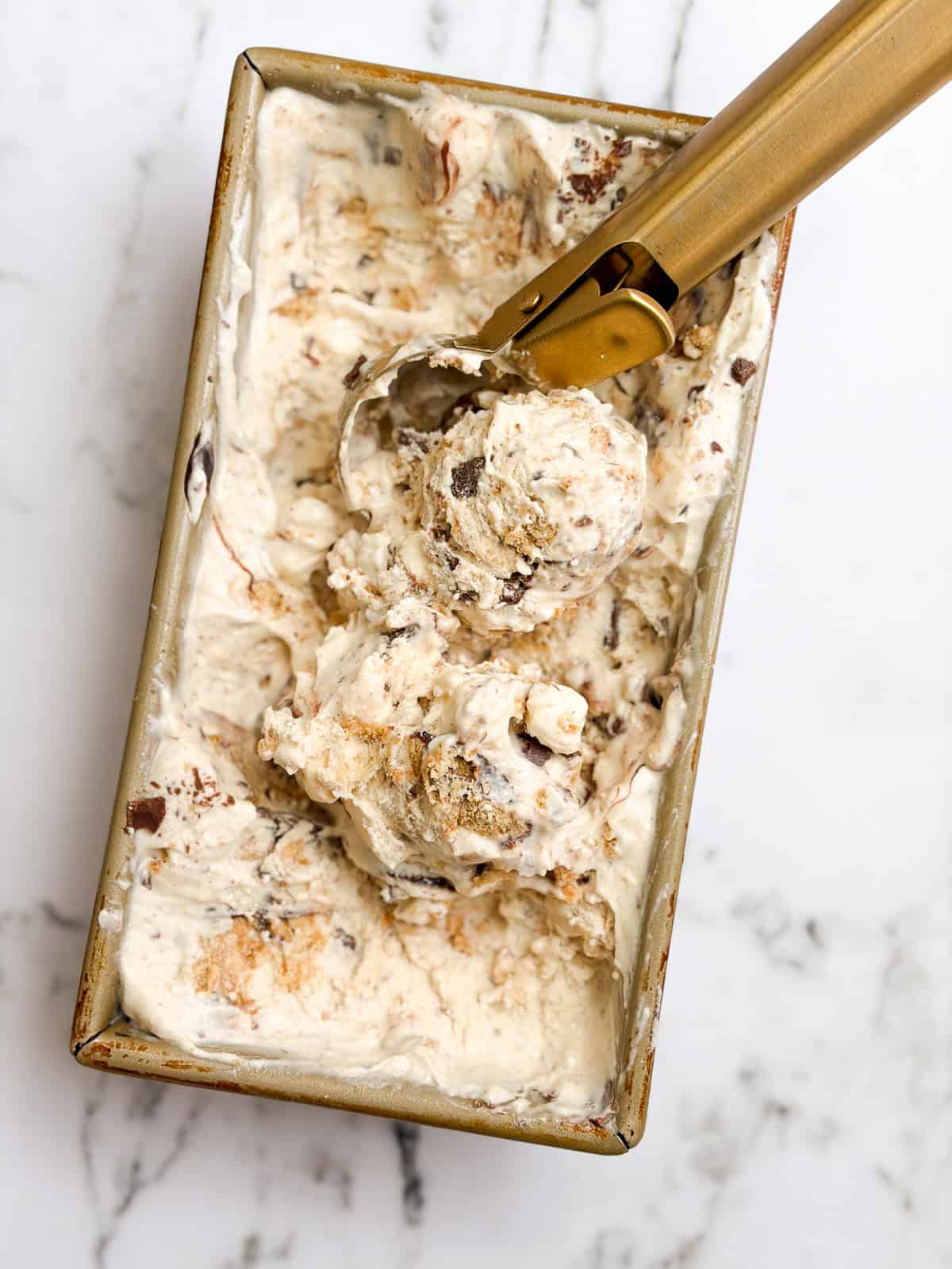 a few scoops of s'mores ice cream with the scoop.