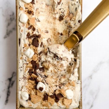 an ice cream scoop scooping out some homemade s'mores ice cream.
