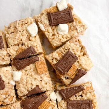 a few s'mores golden graham rice krispie treats cut into squares.