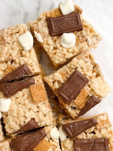 a few s'mores golden graham rice krispie treats cut into squares.