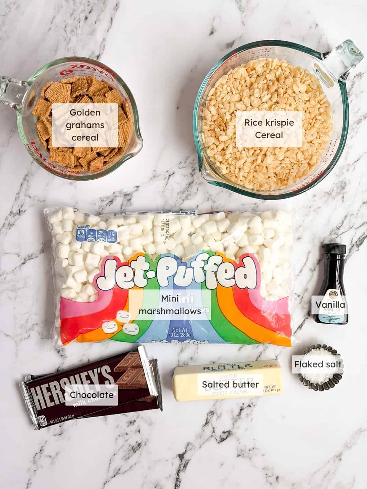 All of the ingredients needed to make S'mores Rice Krispie treats.