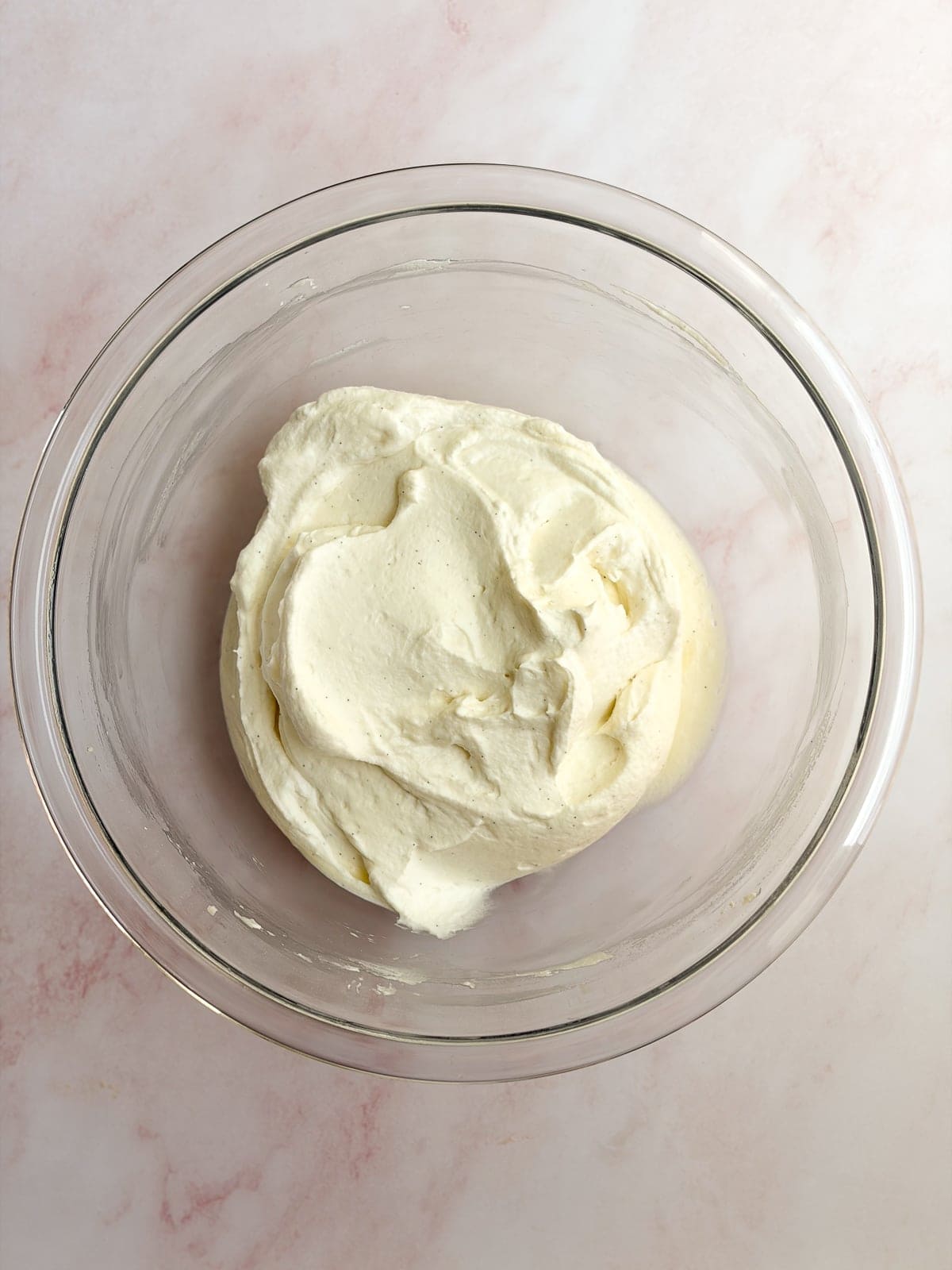 whipped cream frosting in a bowl.