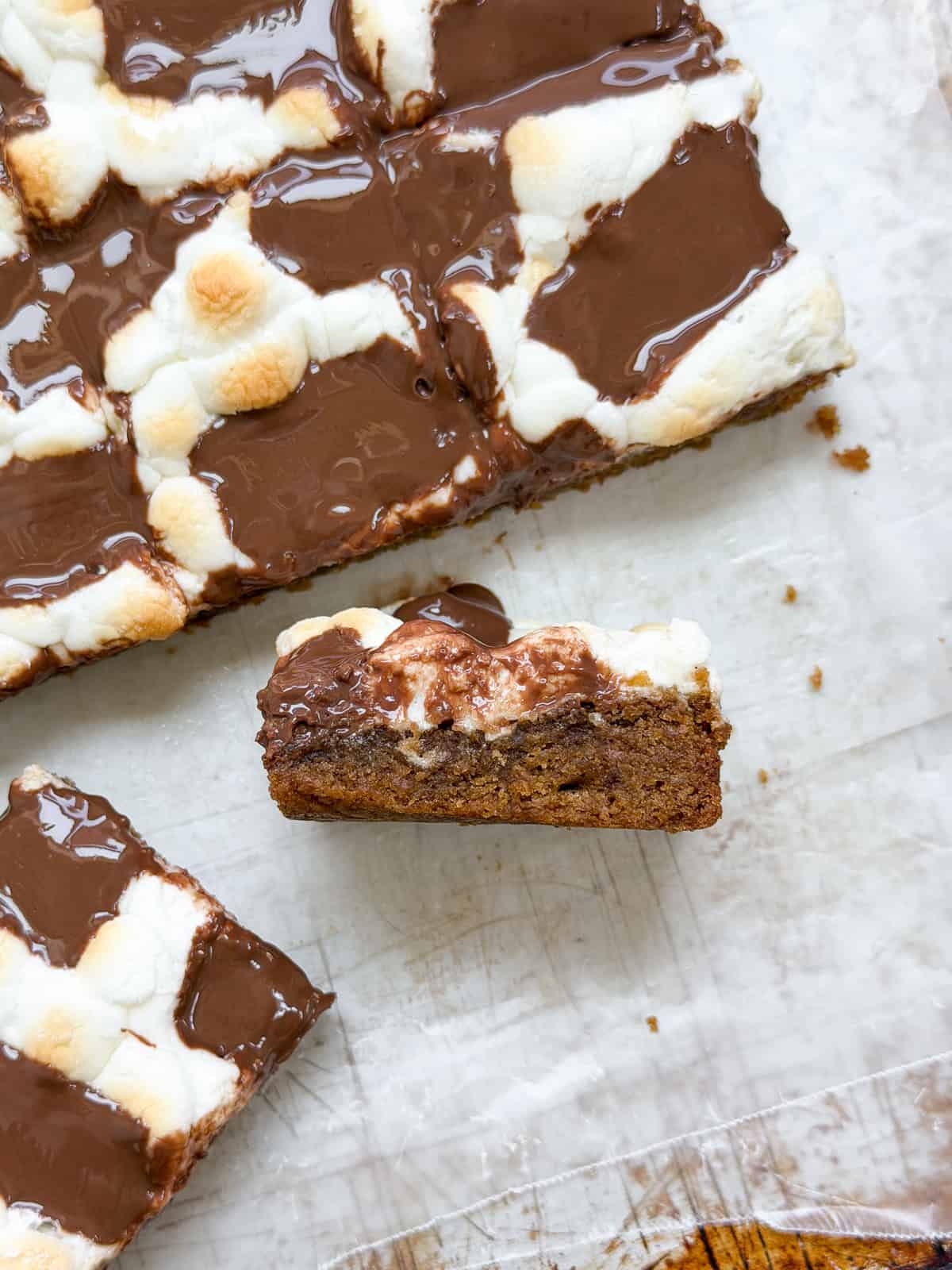 a side view of the s'mores cookie bars so you can see the layers.