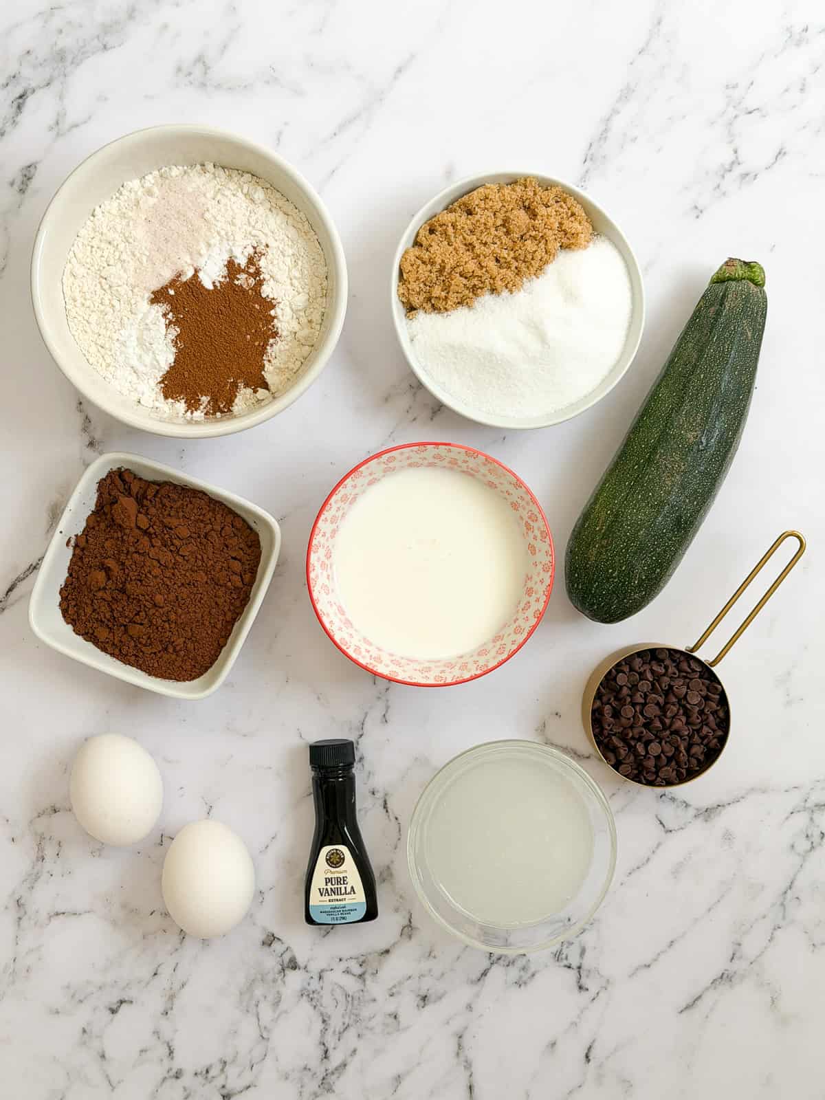 all the ingredients to make these double chocolate zucchini muffins.