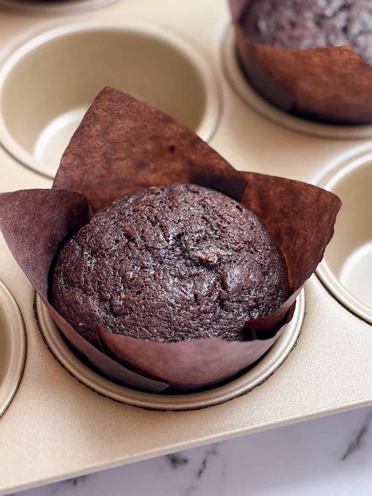 a side view of a muffin so you can see how tall they become.