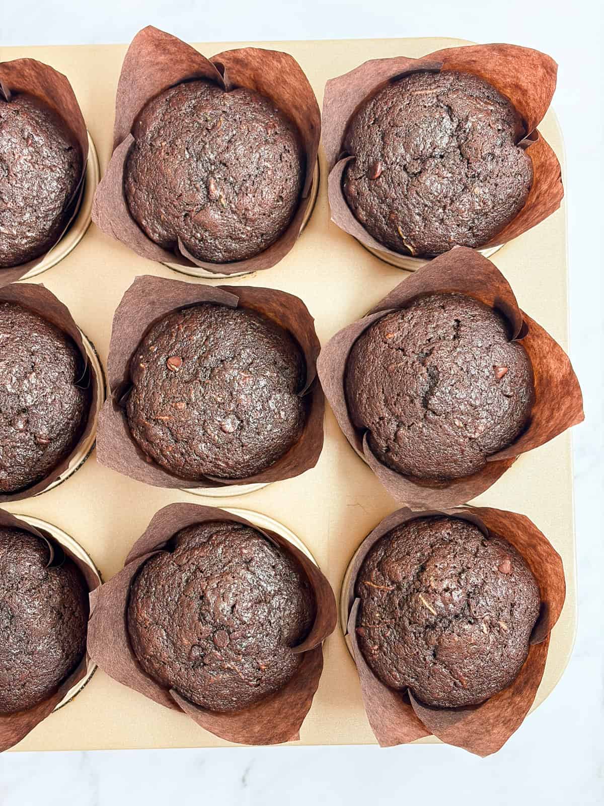 a bunch of the muffins in the muffin tin.